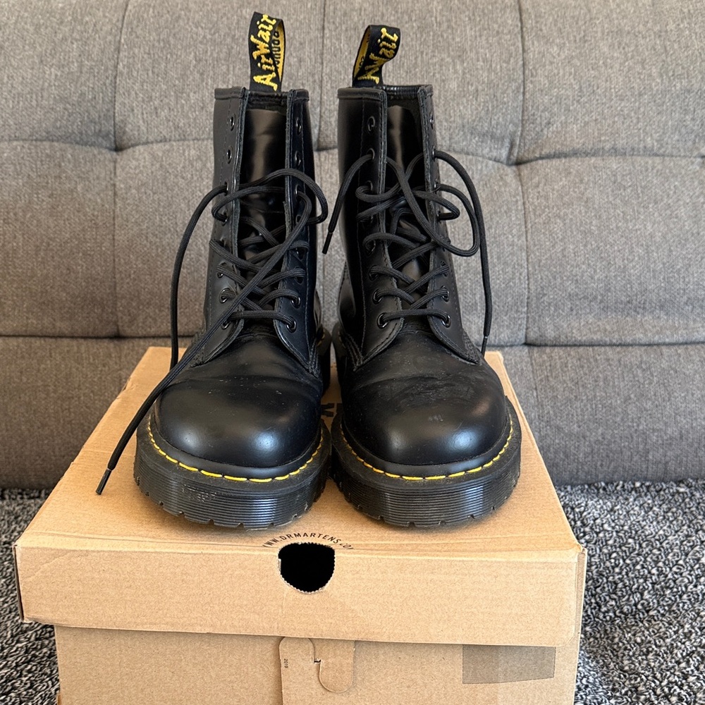 Dr. Martens Black Leather 8-Eye Lace-Up Boots with Yellow Stitching
